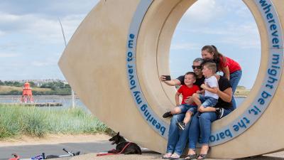 Family taking a selfie at The Eye