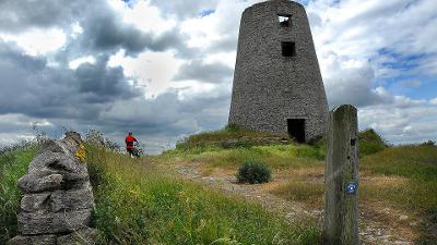 Cyclist beside Cleadon Windmill