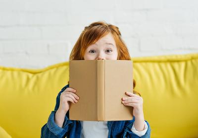 Kid with a book